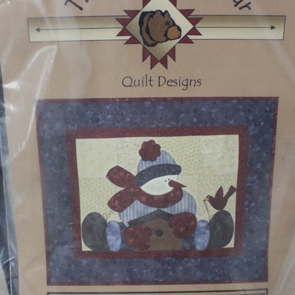The Wooden Bear Straddling Snowboy Quilt Kit 19.5x23.5 Blue Winter Snowman DIY